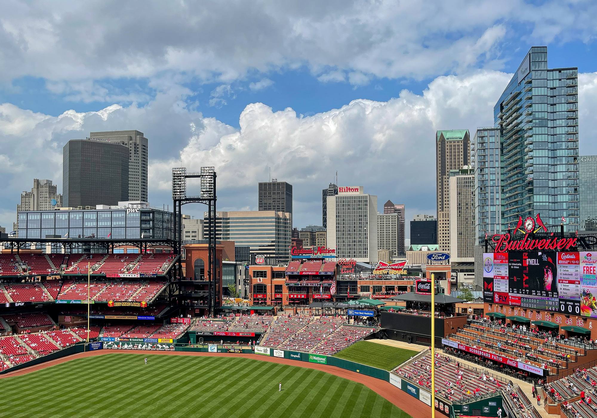 The Ballpark Village towers, including the Live! by Loews cluster, rising beyond Busch Stadium