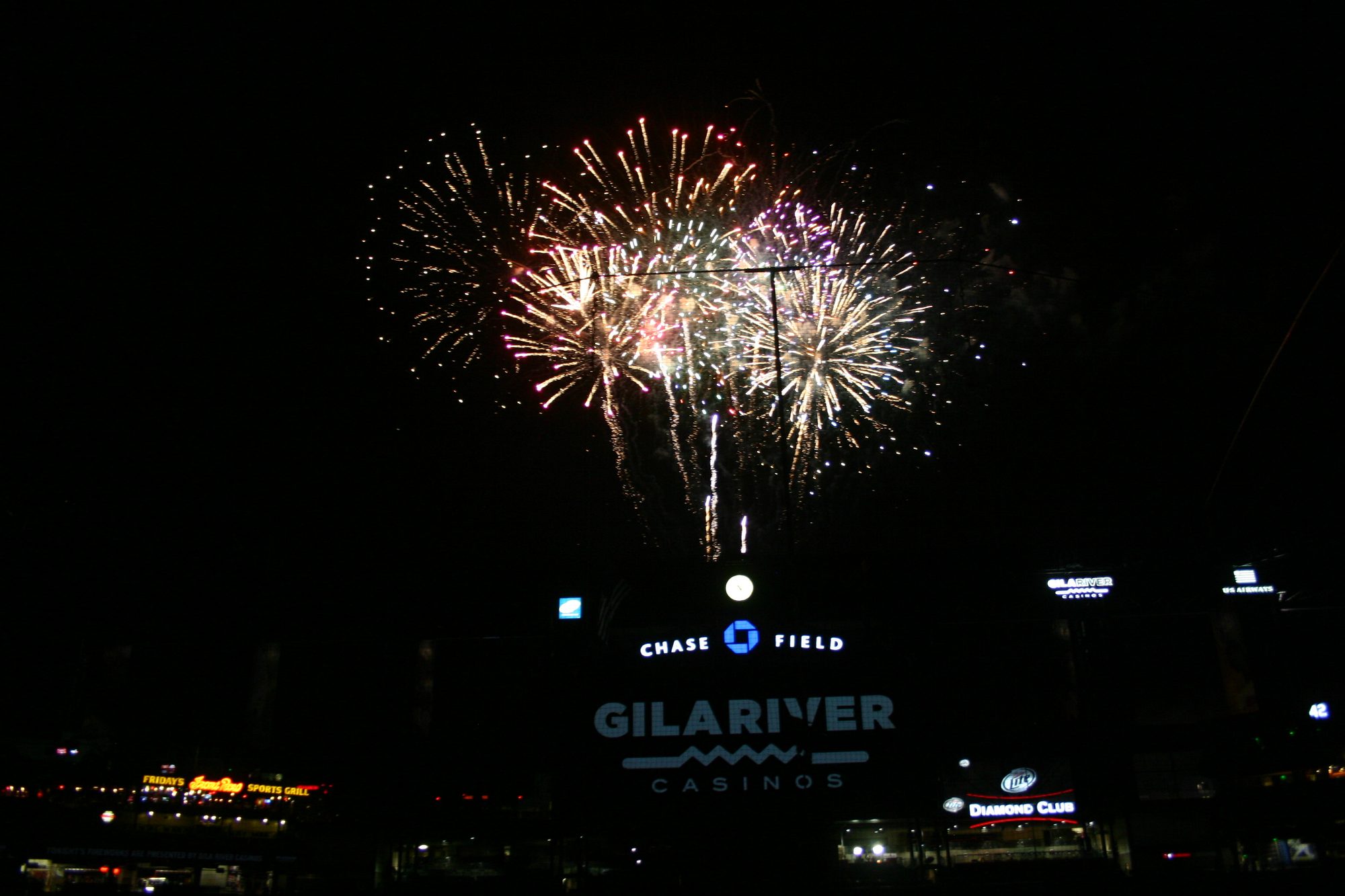 The Chase Field bowl on a shoulder-season evening with the roof open to the desert sky