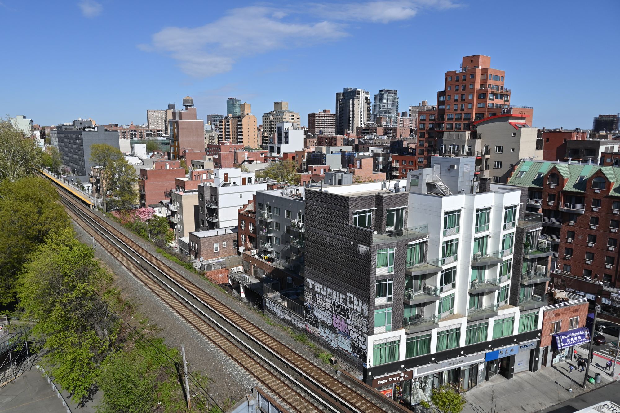Downtown Flushing, Queens, from a hotel rooftop, with the railroad tracks cutting through the neighborhood