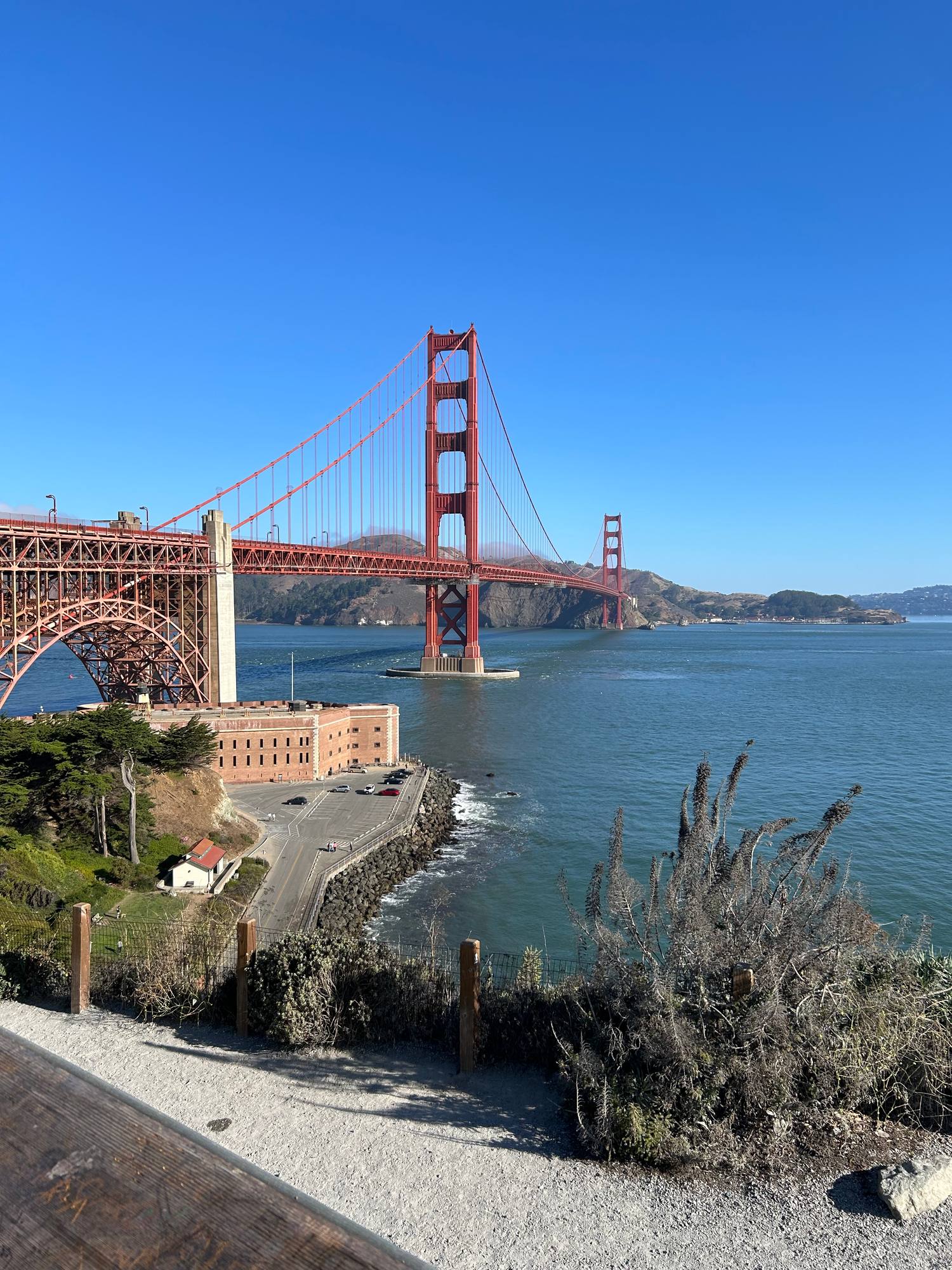 The Golden Gate Bridge seen from the overlook on the Marin side, with the San Francisco skyline behind it